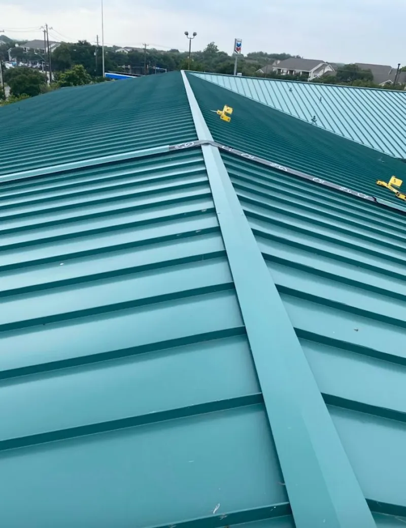 Green commercial metal roof ridge and valley for Metal Roof Repair in Destrehan